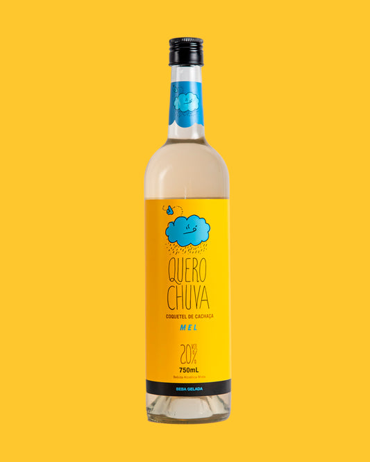 Garrafa Quero Chuva Mel 750 ml em fundo amarelo — à base de cachaça, pronta para beber